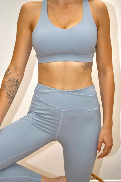 flow freely and ethicaly v cut yoga legging snug fit compressive soft fabric recyclable materials sustainable yoga wear collection 